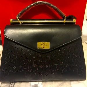 BCBGMaxAzria leather perforated messenger bag